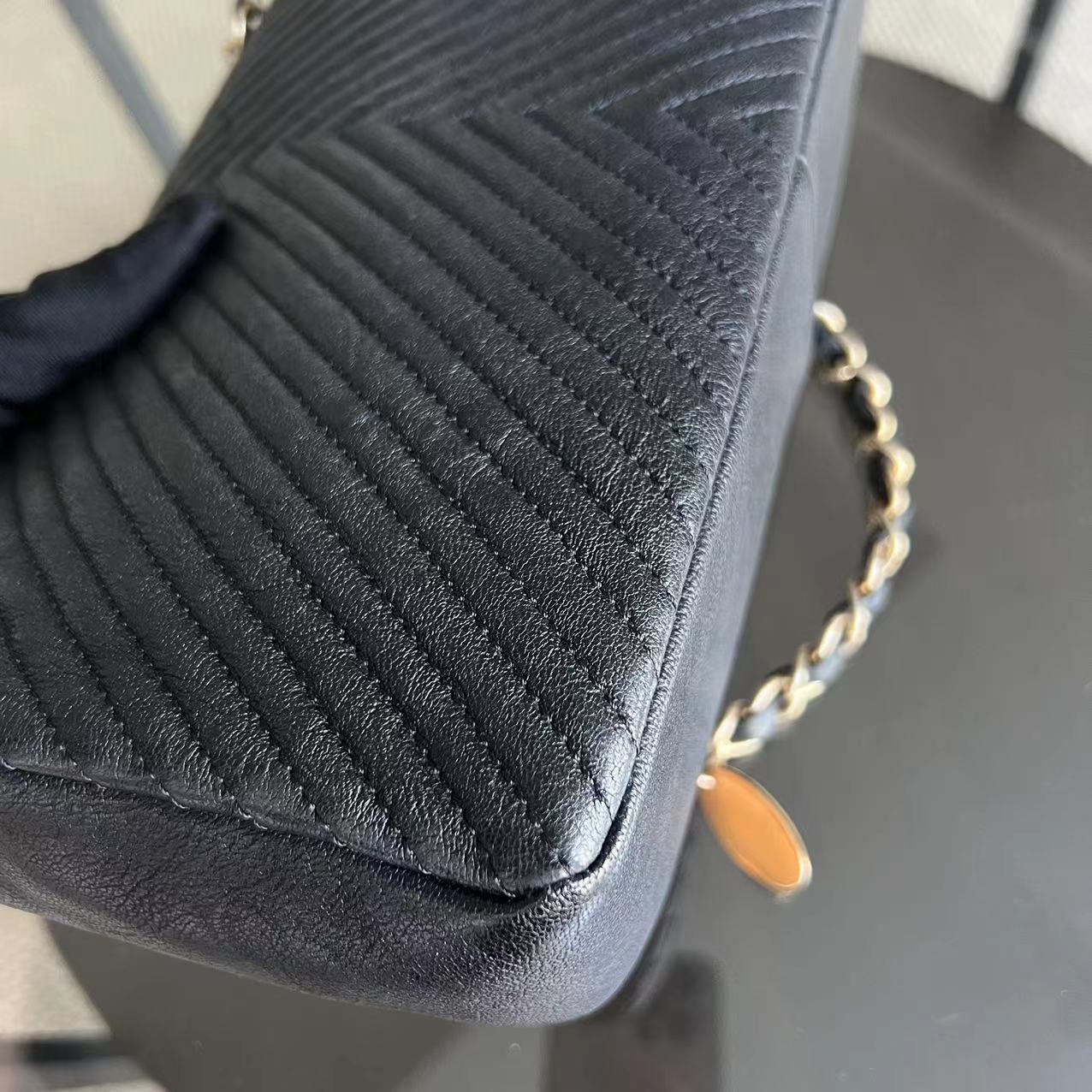 Seasonal Herringbone Medium Flap in Black Distressed Calfskin Aged Golden Hardware Series 21