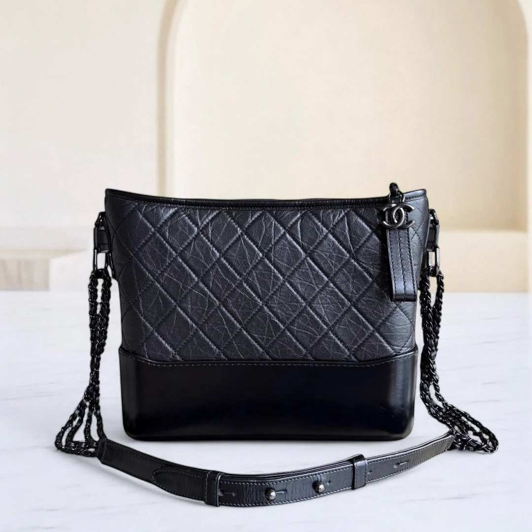 Chanel Gabrielle Medium - Quilted Aged Calfskin Black All Black Hardware Series 29