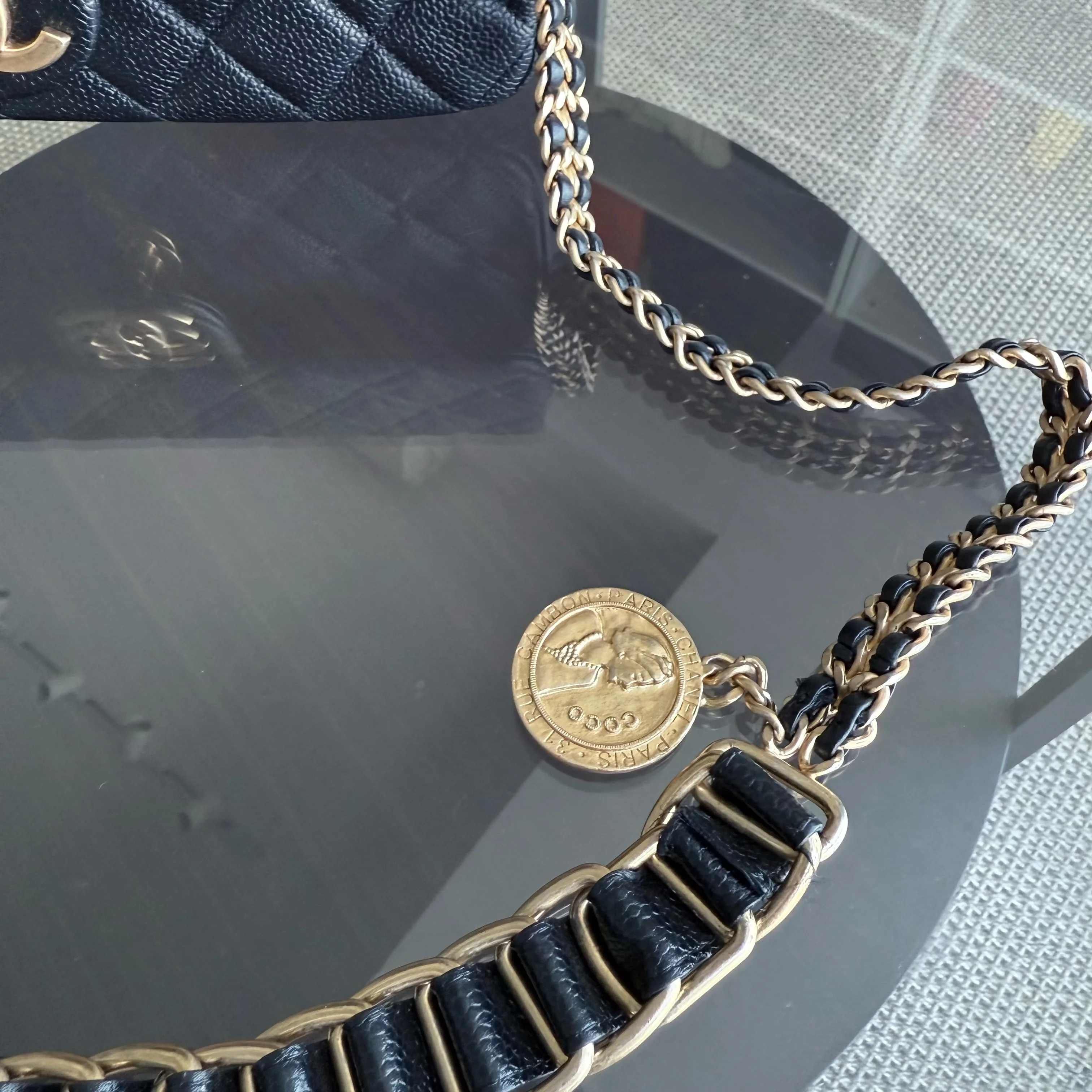 Chanel Seasonal Flap Bag - Caviar Quilted Medallion Soul Black Caviar Gold Hardware Microchip