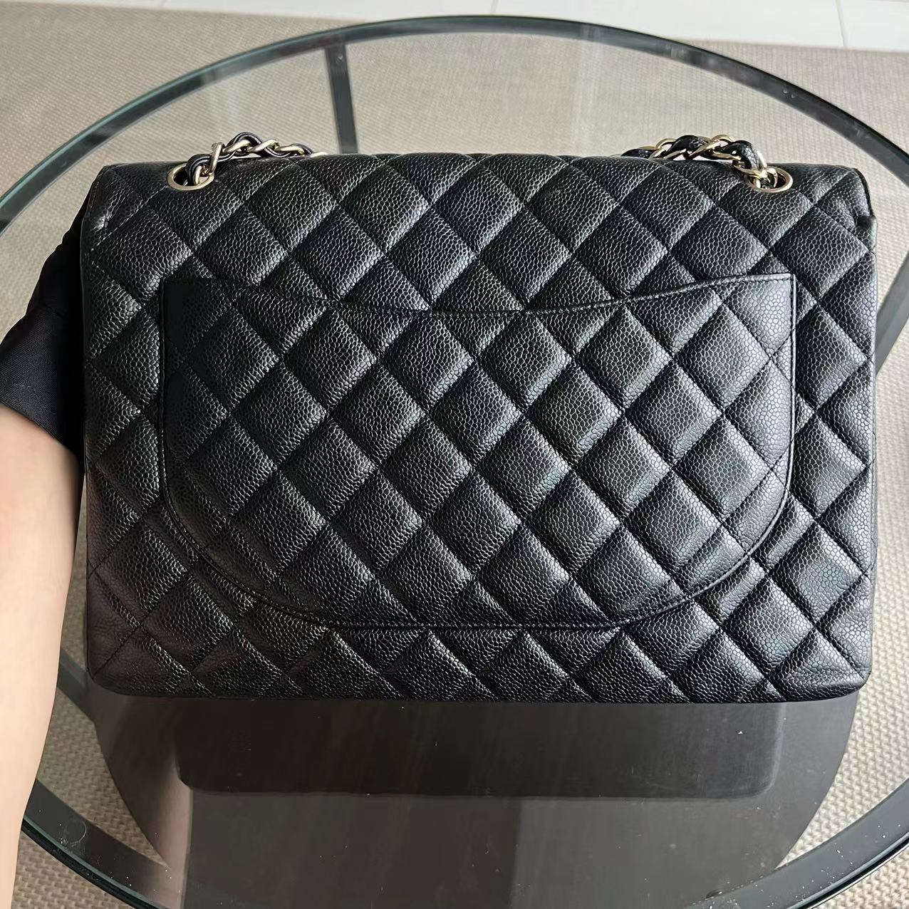Chanel Caviar Maxi Classic Flap Single Flap Quilted Grained Calfskin Black Golden Hardware Series 13 - Best Luxury Designers