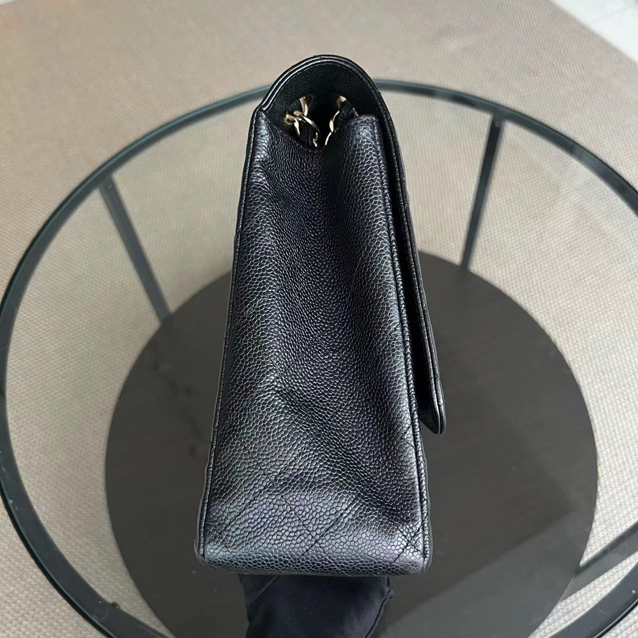 Chanel Caviar Maxi Classic Flap Single Flap Quilted Grained Calfskin Black Golden Hardware Series 13 - Best Luxury Designers