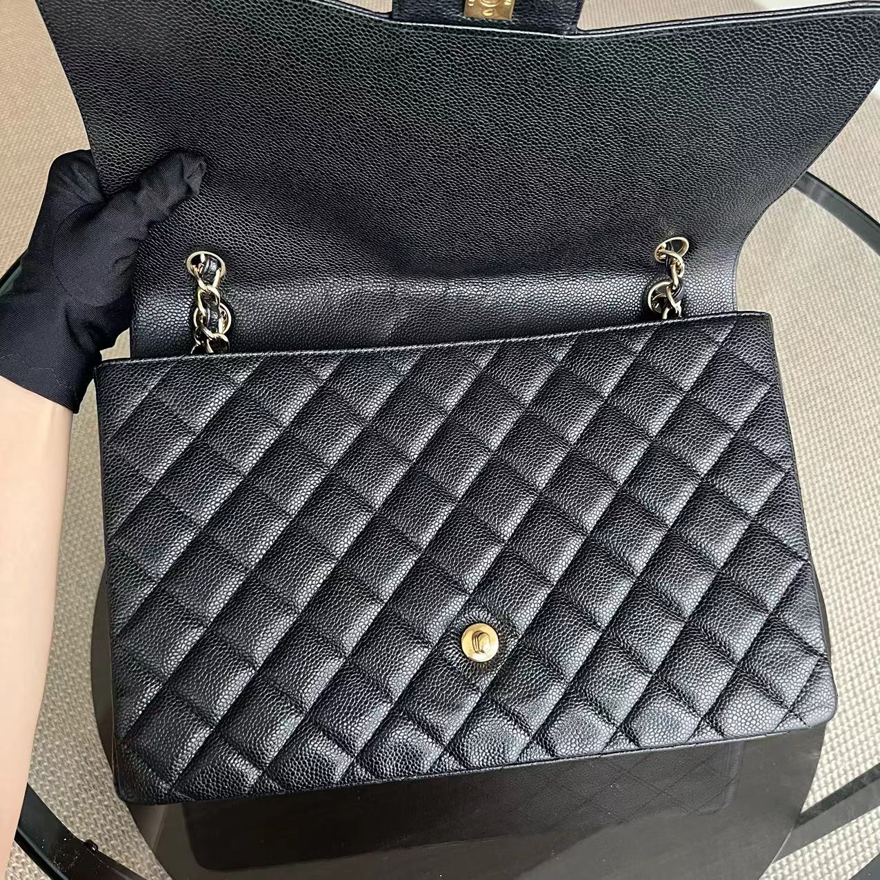 Chanel Caviar Maxi Classic Flap Single Flap Quilted Grained Calfskin Black Golden Hardware Series 13 - Best Luxury Designers