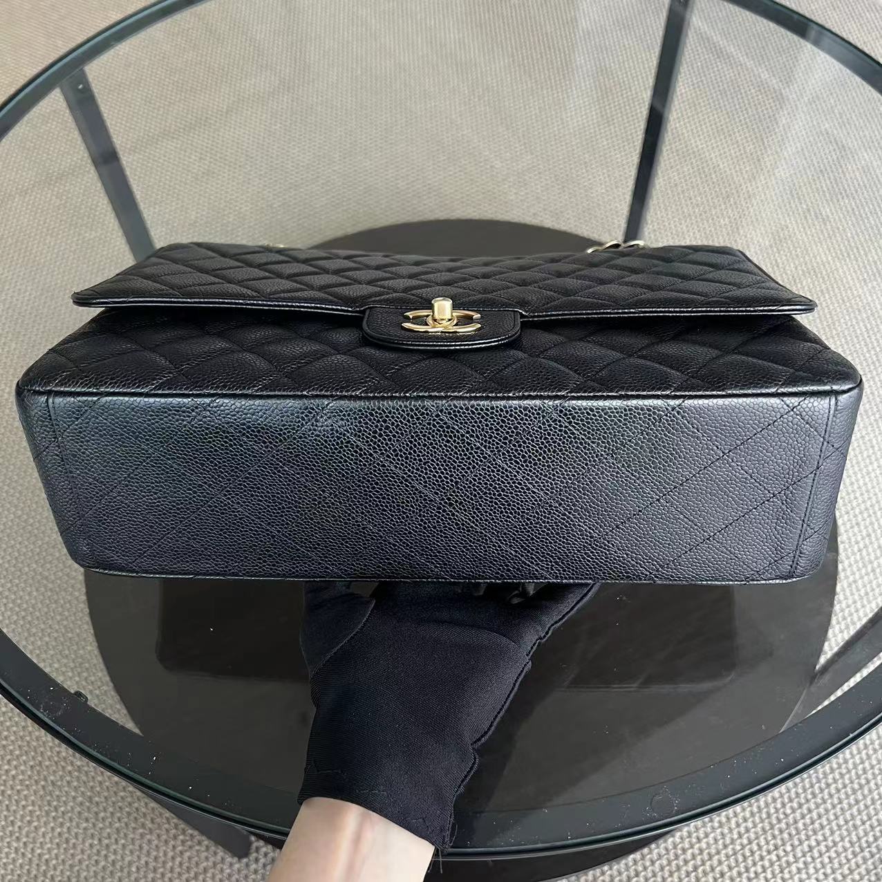 Chanel Caviar Maxi Classic Flap Single Flap Quilted Grained Calfskin Black Golden Hardware Series 13 - Best Luxury Designers