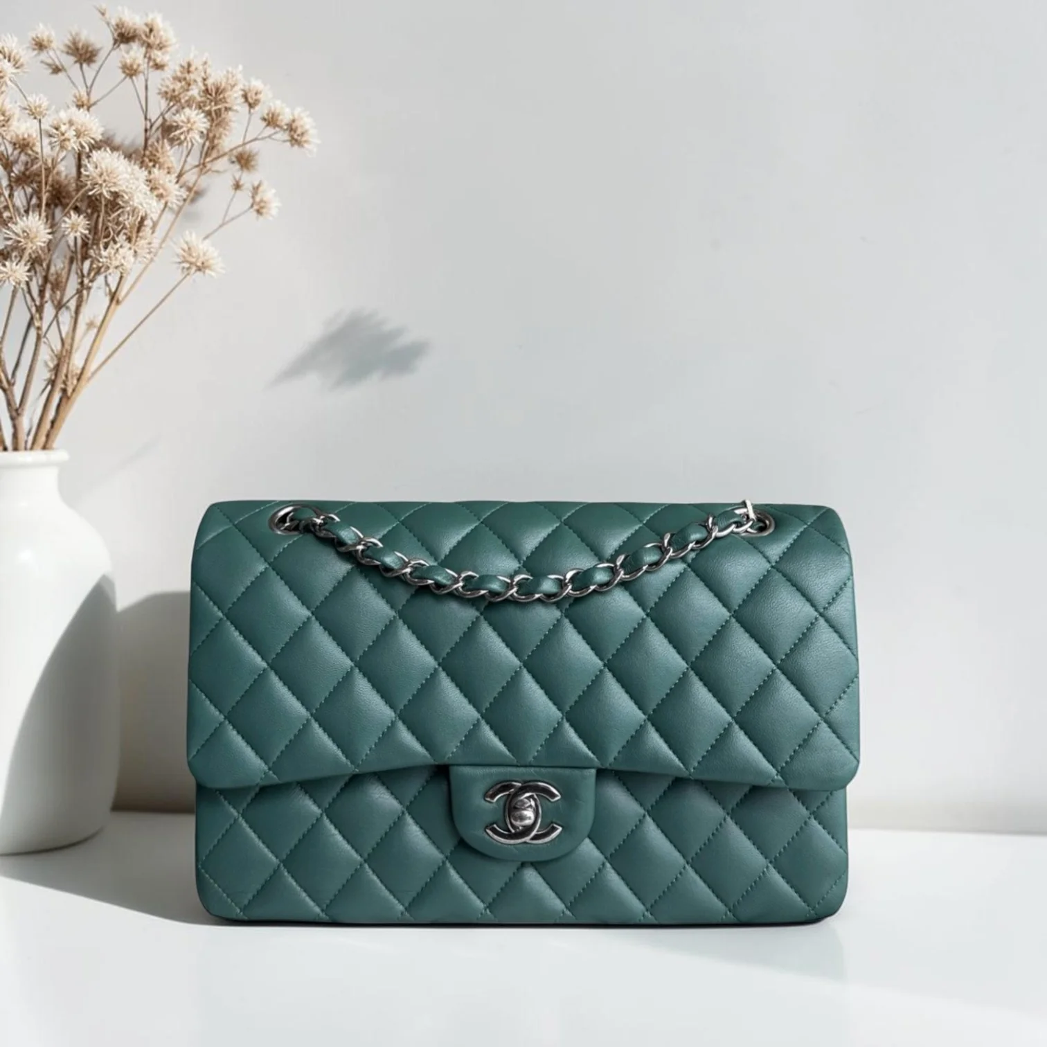 Best Luxury Designers Chanel Classic Flap medium quilted lambskin bag in olive green with silver hardware.