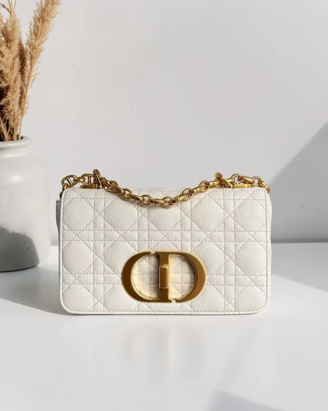 Best Luxury Designers white grained calfskin Dior Caro small bag with gold hardware and CD clasp.